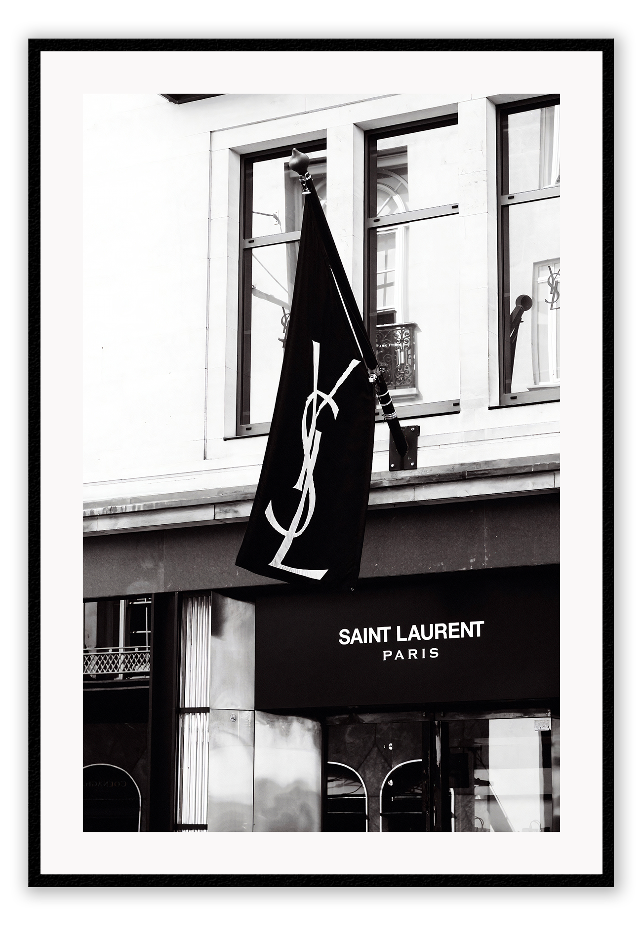 A black and white wall art with iconic Yves Saint Laurent Bond Street shop in London