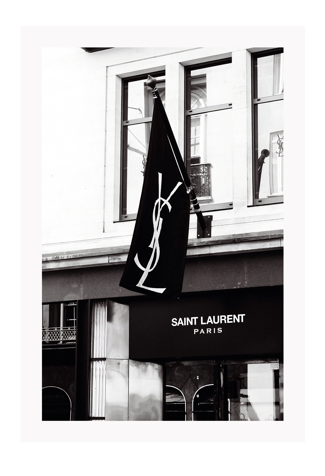 A black and white wall art with iconic Yves Saint Laurent Bond Street shop in London