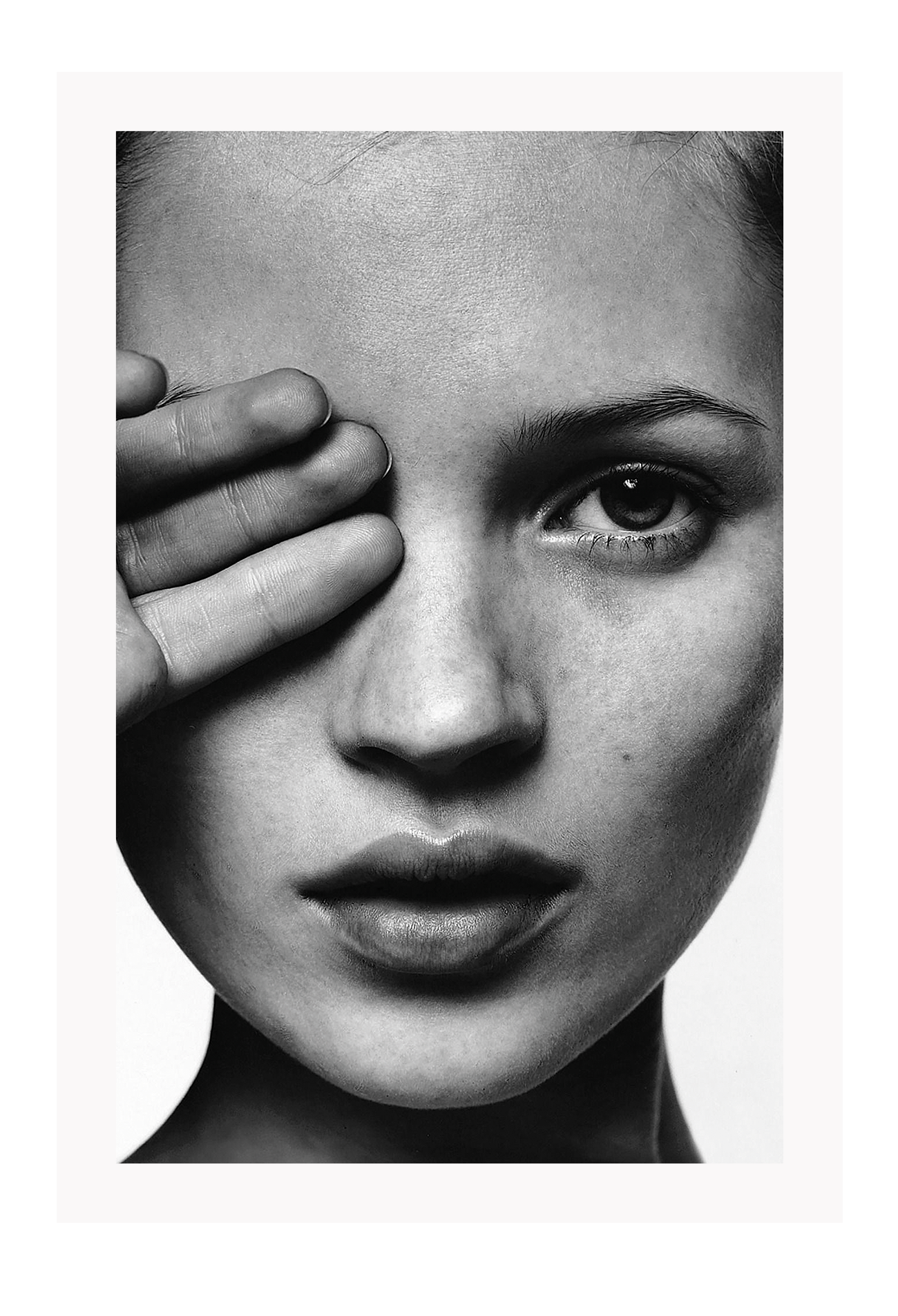 An iconic fashion wall art with 90s English model Kate Moss in black and white.