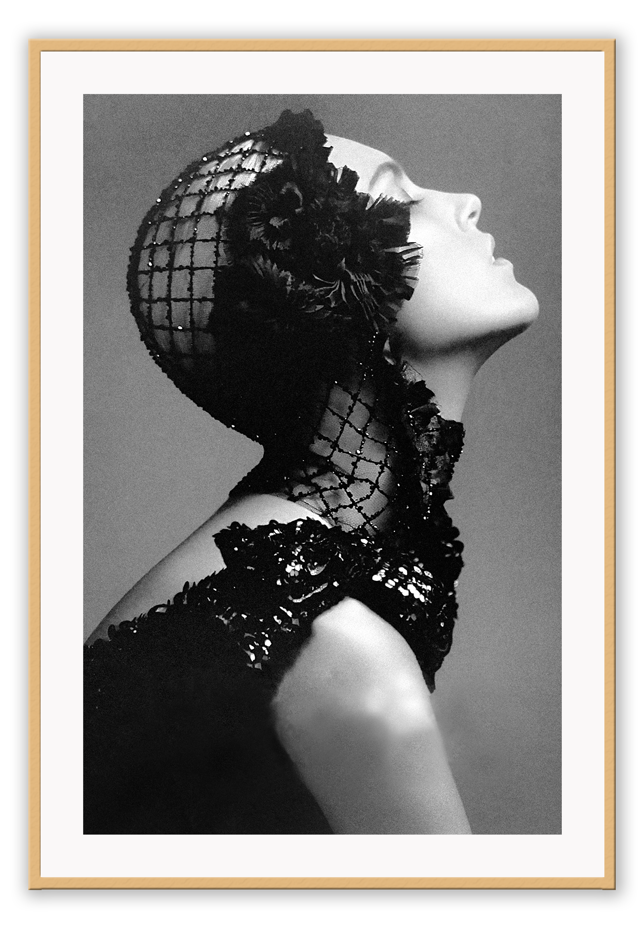 A black and white, vintage fashion wall art with Coco chanel woman wearing black lace flower.