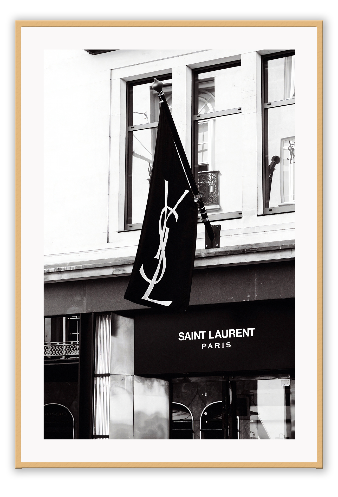 A black and white wall art with iconic Yves Saint Laurent Bond Street shop in London