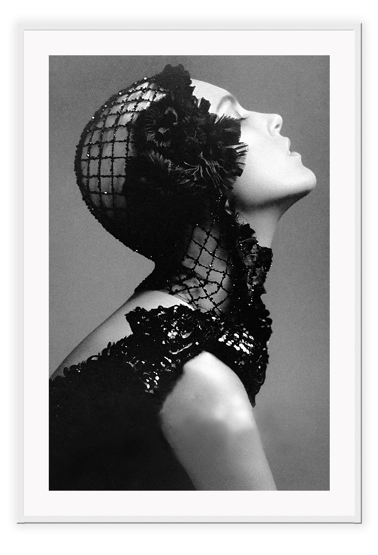 A black and white, vintage fashion wall art with Coco chanel woman wearing black lace flower.