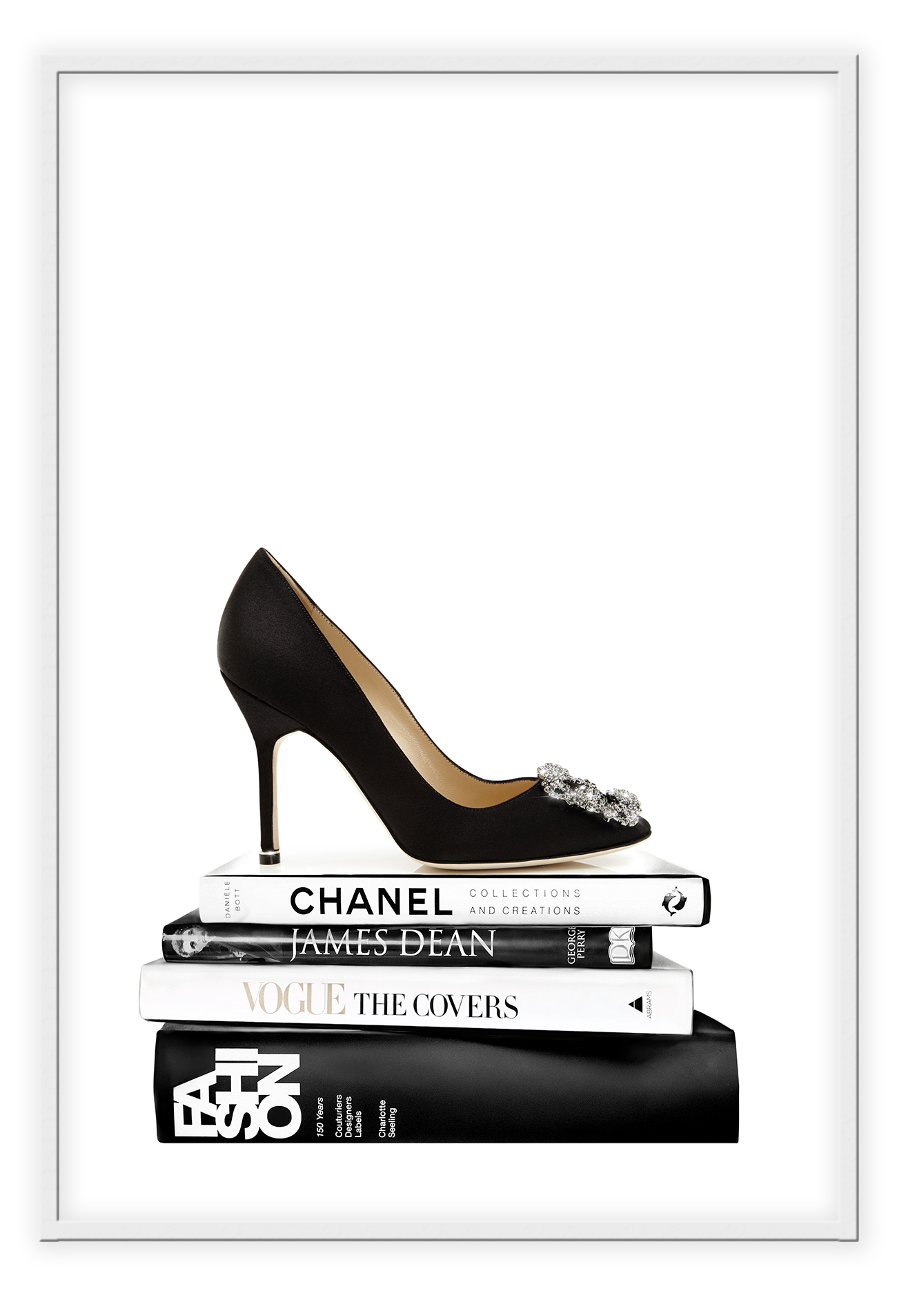 Portrait print with black and white books and high heel on the top; of the book stack