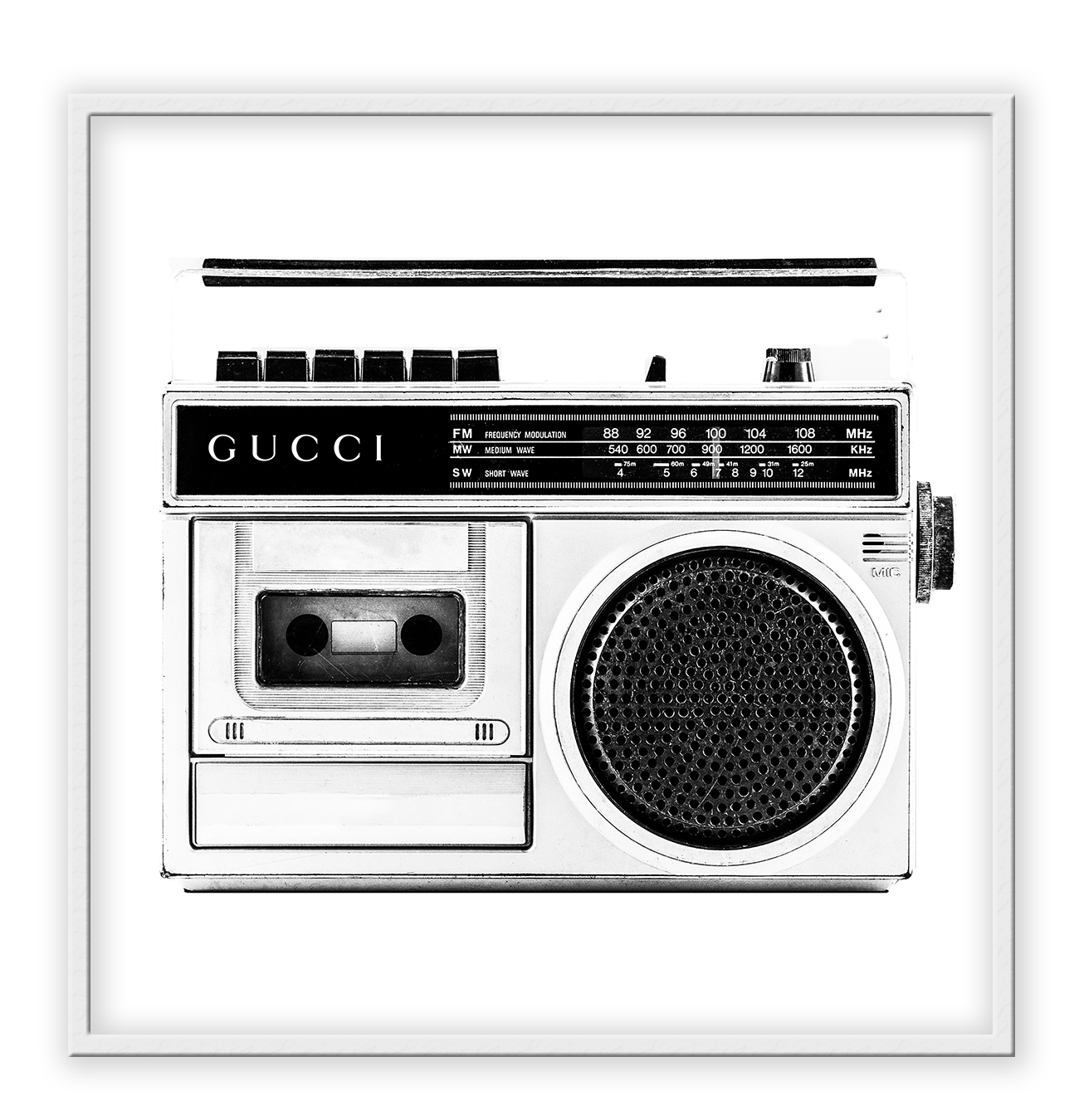 A vintage fashion wall art with Gucci fashion label on 80s 90s vintage recorder in black and white.