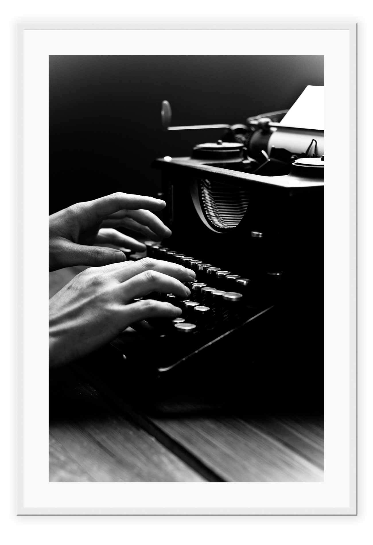 A vintage black and white wall art of a vintage type writer.