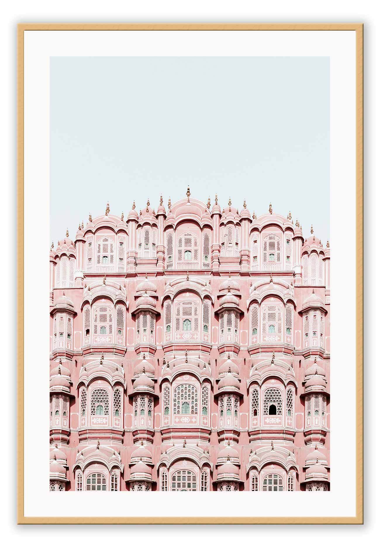 An urban wall art with pink indian architecture masterpiece.