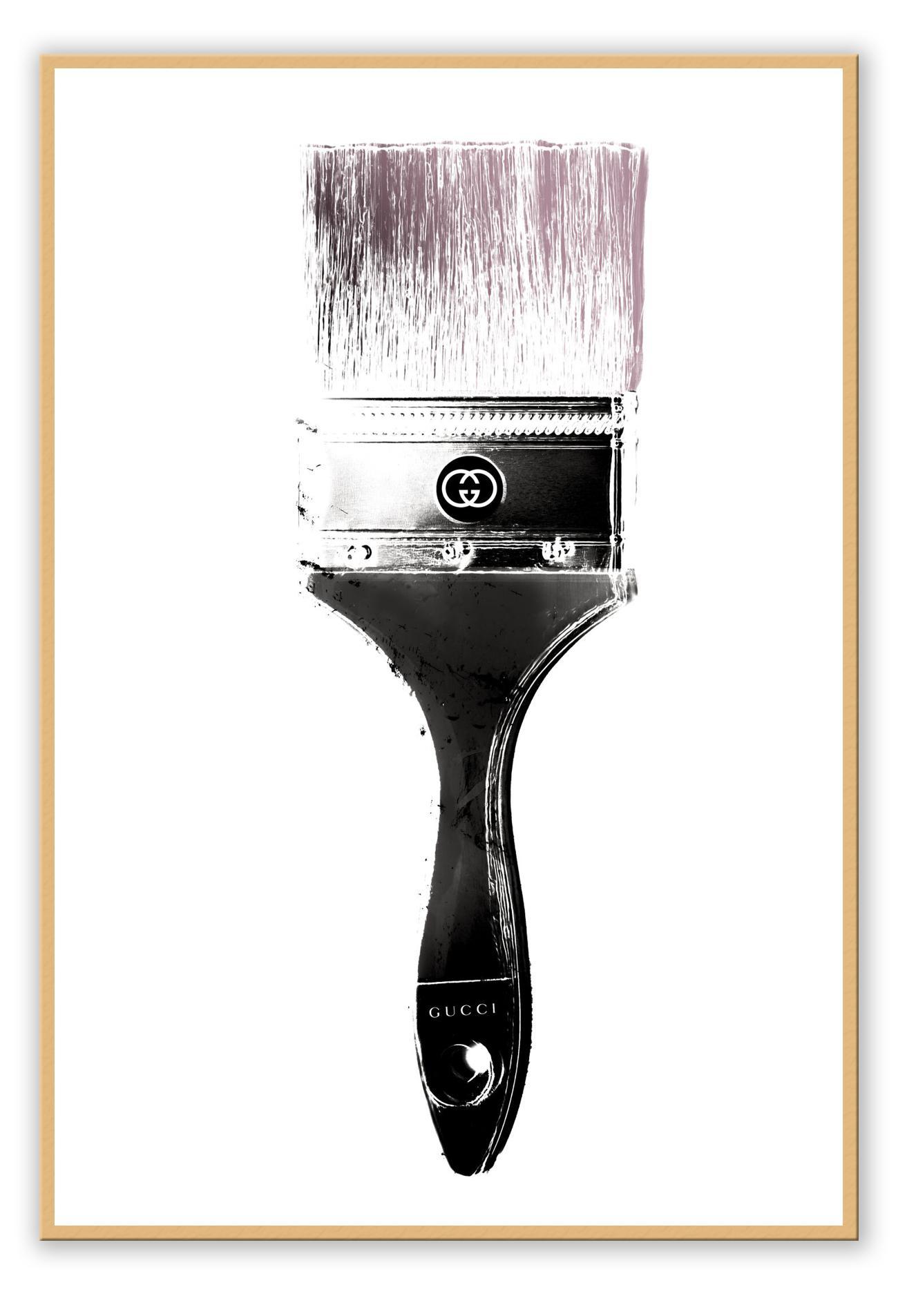 Pink brush with silver and black Gucci paint on white background minimal fashion print