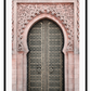 A classic morrocan architecture wall art with a pink door front and great relief carving details.