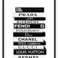Stack of black and white books fashion photography iconic designers prada dior hermes louis vuitton