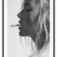 A black and white fashion  photographic wall art with iconic 90s model Kate Moss smoking cigarette. 