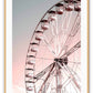 A nursery wall art with ferris wheel in pink and blue sky. 