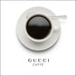 A pink or black and white fashion wall art with a coffee cup and Gucci fashion label in Gucci Caf≈Ω