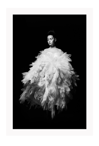 Fashion print with woman in white dress floating on a black background  
