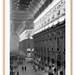 A black and white urban wall art with classic architecture train station London.