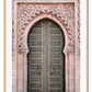 A classic morrocan architecture wall art with a pink door front and great relief carving details.