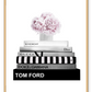 Fashion print black and white fashion books stacked pink  flowers on top givenchy gucci tom ford dolce dior  