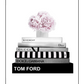 Fashion print black and white fashion books stacked pink  flowers on top givenchy gucci tom ford dolce dior  