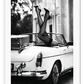Fashion photography with womans legs coming out of a vintage car black and white lingerie sexy  