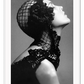 A black and white, vintage fashion wall art with Coco chanel woman wearing black lace flower. 
