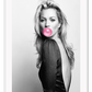 An iconic fashion wall art with 90s English model Kate Moss and pink bubble gum.