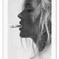 A black and white fashion  photographic wall art with iconic 90s model Kate Moss smoking cigarette. 