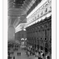 A black and white urban wall art with classic architecture train station London.
