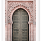 A classic morrocan architecture wall art with a pink door front and great relief carving details.