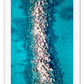 Ocean water rocks blue symmetry waves ripple clear sea 