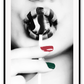 Black and white modern print featuring a woman sucking a lollypop with one green one red finger nail and striped lipstick.