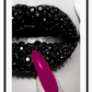 Fashion print of close-up diamond covered lips in black and white with a hot pink fingernail touching mouth