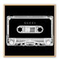 A vintage fashion wall art with Gucci fashion label on 80s 90s vintage cassette tape in fluro black and white inverted colour.