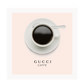 A pink or black and white fashion wall art with a coffee cup and Gucci fashion label in Gucci Caf≈Ω