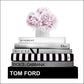 Fashion art square print stacked designer book floral arrangement on top tom ford chanel pink black white border.