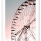 A nursery wall art with ferris wheel in pink and blue sky. 
