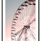 A nursery wall art with ferris wheel in pink and blue sky. 