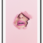 A pink wall art with fashion model face and pink lips. 