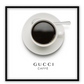 A pink or black and white fashion wall art with a coffee cup and Gucci fashion label in Gucci Caf≈Ω