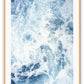 Ocean print with a close-up of the blue sea and white wash. 