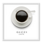 A pink or black and white fashion wall art with a coffee cup and Gucci fashion label in Gucci Caf≈Ω