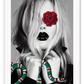 Fashion print Kate Moss model black and white with red rose over one eye holding a green and red gucci snake. 