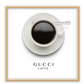 A pink or black and white fashion wall art with a coffee cup and Gucci fashion label in Gucci Caf≈Ω